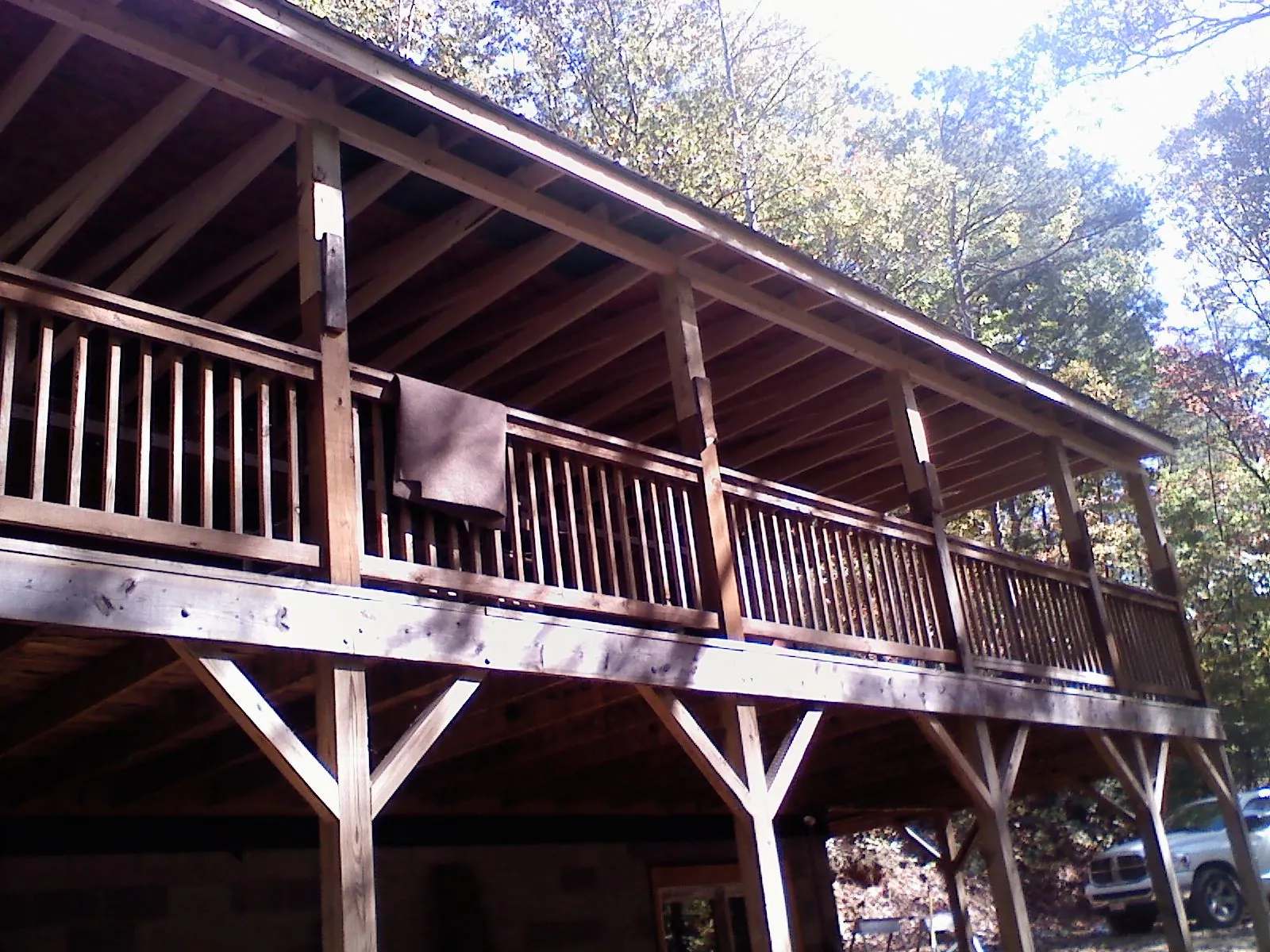 Timber framing under a new elevated porch and deck in Mishicot